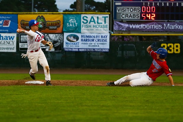 Crabs Second Baseman Nick Salas tags the base as he makes a throw to first during the Humboldt Crabs season opening game against the Humboldt Eagles on June 3, 2022 on the way to a 13-0 victory. - THOMAS LAL