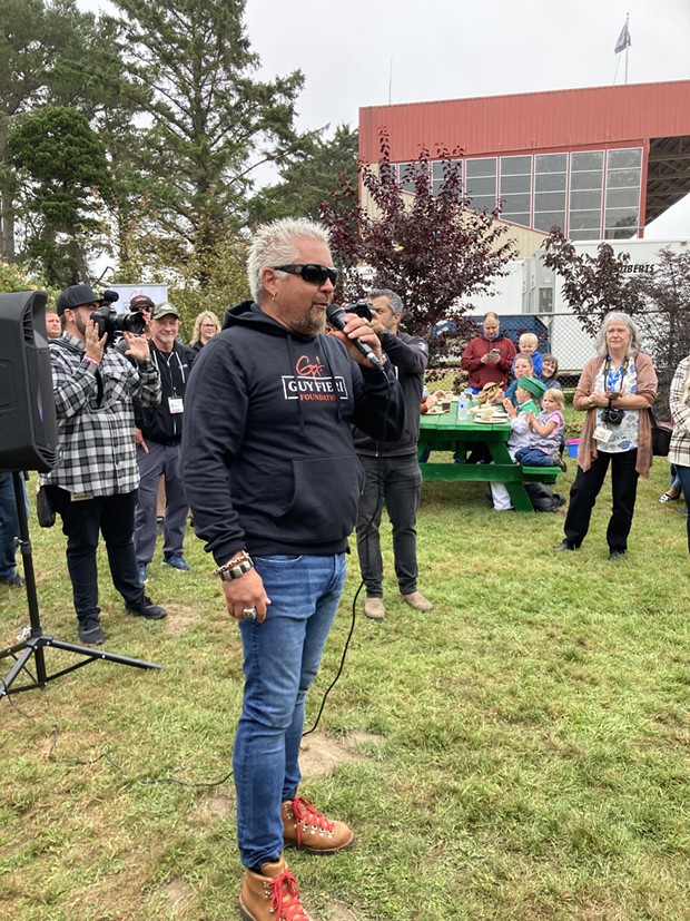 Guy Fieri and his crew filming at his free barbecue lunch for veterans and first responders during the Humboldt County Fair this past summer. - PHOTO BY JENNIFER FUMIKO CAHILL