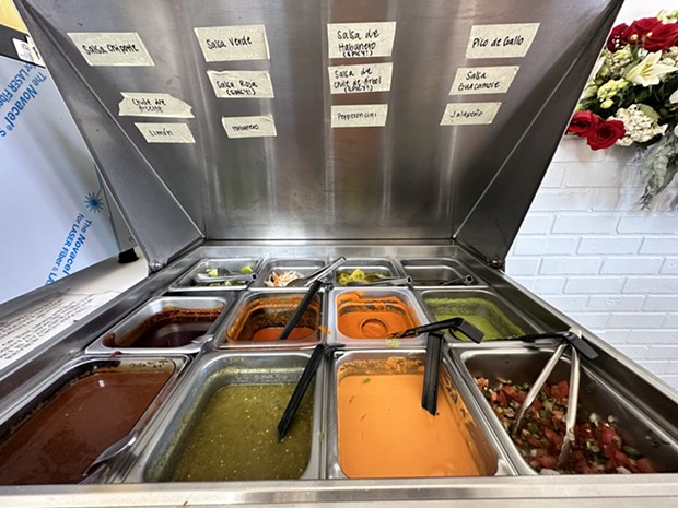 A rainbow of salsa options at Paco's Tacos Taqueria. - PHOTO BY JENNIFER FUMIKO CAHILL
