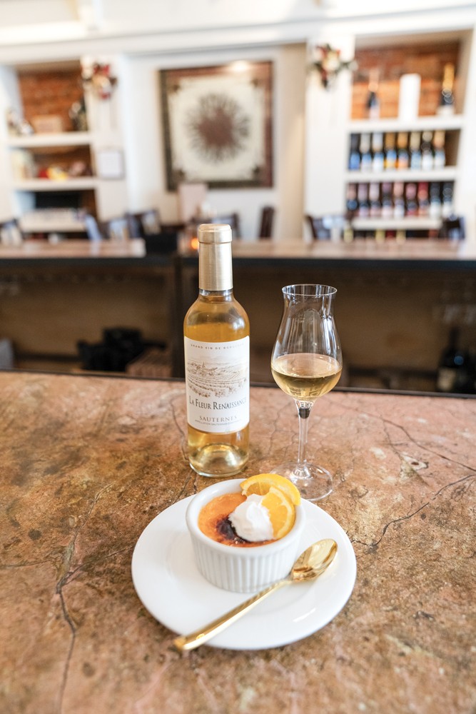 Orange cr&egrave;me br&ucirc;l&eacute;e paired with a Sauterne. - PHOTO BY HOLLY HARVEY