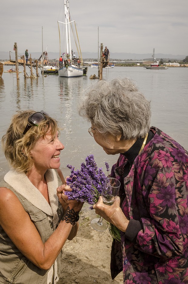 Chris Willrodt, of Comptche, greeted Hiroshima atomic bomb survivor Shigeko Sasamori after  the launching of the Golden Rule on Saturday, June 20 at the Zerlang & Zerlang  boat yard on the Samoa peninsula. - MARK LARSON