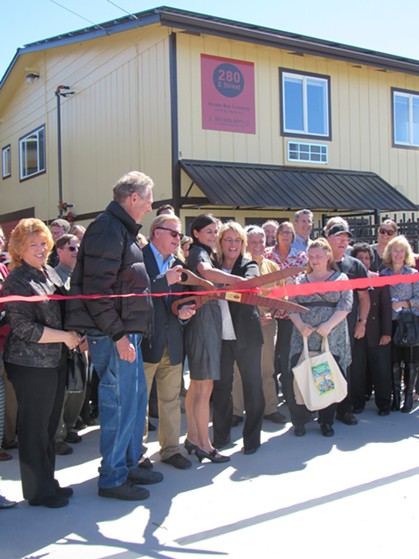 Arcata Mayor Michael Winkler, Beth Matsumoto of Humboldt Bay Housing Development and others prepare to cut the ribbon. - LINDA STANSBERRY