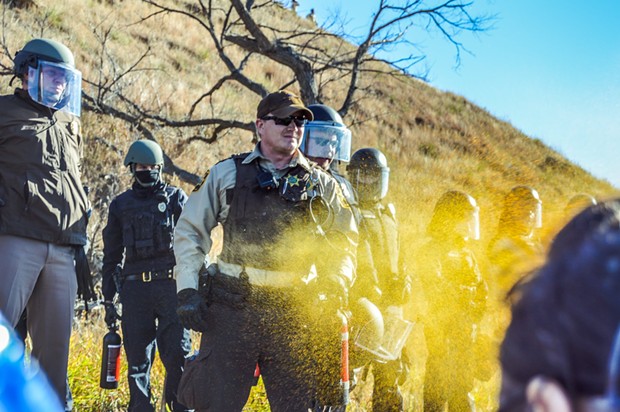 Protesters are pepper sprayed while occupying the proposed route of the Dakota Access Pipeline. - ROB WILSON