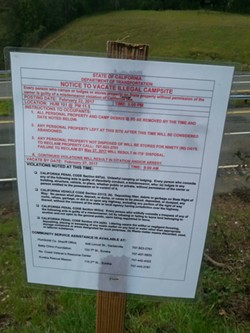 A notice posted near a homeless camp on U.S. Highway 101 near Garberville telling people to be out by Feb. 27, the date of the Point in Time Count. - DEBRA CAREY