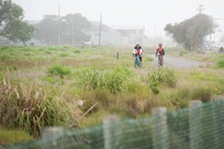 Cyclists enjoying the new trail. - PHOTO BY MARK MCKENNA