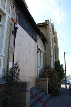 The boarded up front porch of the Arcata Presbyterian Church on 11th and G streets. - THADEUS GREENSON