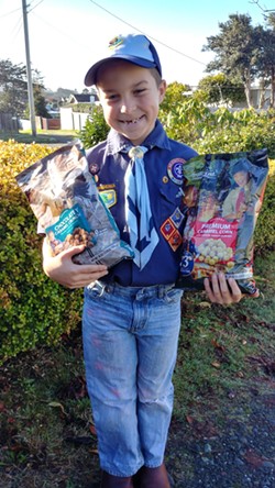 Eight-year-old Noah showing off his Scout corn. - SUBMITTED