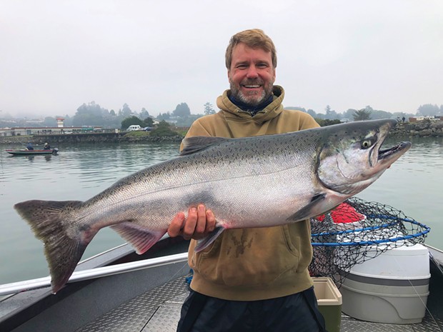 Eric Woyce, of San Francisco, holds a 25-pound king salmon caught Oct. 7 while fishing the Chetco River estuary with guide Andy Martin of Wild Rivers Fishing. He was trolling a herring behind a Fish Flash flasher.&nbsp;