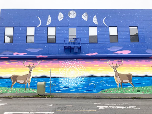 "Honor the Land," a mural by Tamar Atik, on the exterior of Global Village Gallery in Arcata.
