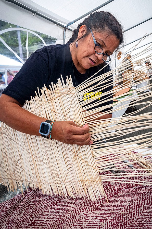 Phyllis Hunter, of the Mono Tribe and Tollhouse, California, demonstrated her weaving technique in making a cradle board.