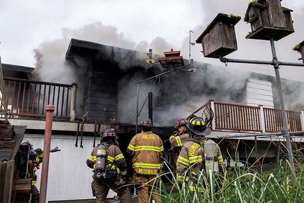 Arcata Fire Protection District personnel at the scene of a fire in the 900 block of Bay View Street last year.
