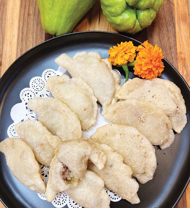 Thick, barely sweet rice flour dumplings stuffed with pork and crunchy chayote.