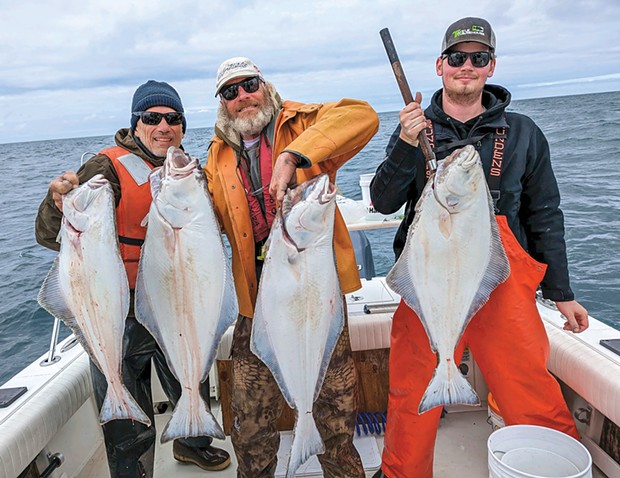A group of happy anglers pose with limits of Pacific halibut boated Thursday out of Eureka.