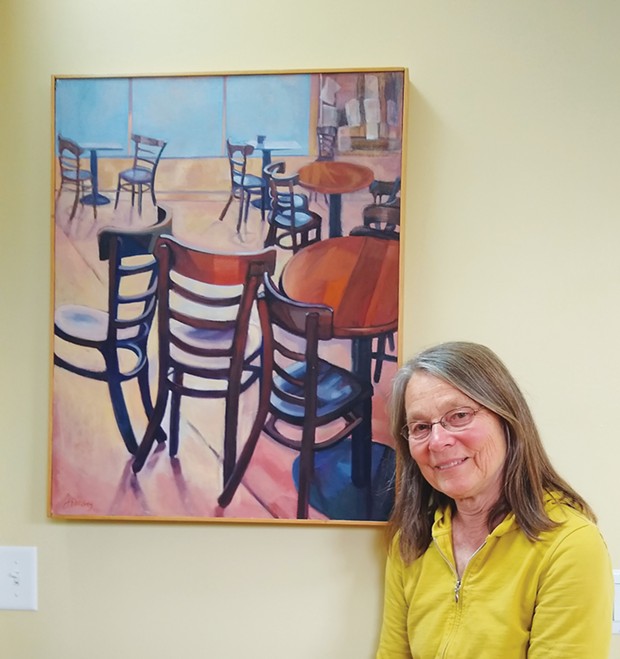Jan Ramsey with her painting of the former Arcata cafe Sacred Grounds.