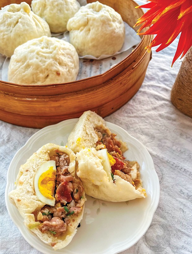 Hearty country dai bao with pork, sausage and egg.