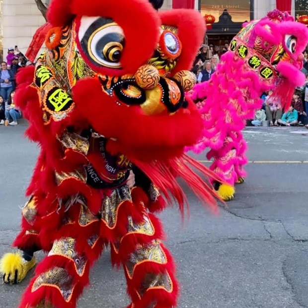 Chinese lion dancers at Clarke Plaza for the Chinatown Street Fair.