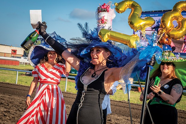 Tracey Van Emmerik (center) of Ferndale celebrated her Most Glamorous award and her runner-up winner prize of $1,000 after the sixth race.