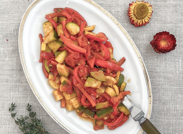 Roasted zucchini with peppers and tomatoes. The author usually eats two portions.