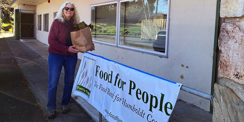 Food for People Executive Director Anne Holcomb in front of the nonprofit's new temporary Eureka pantry.