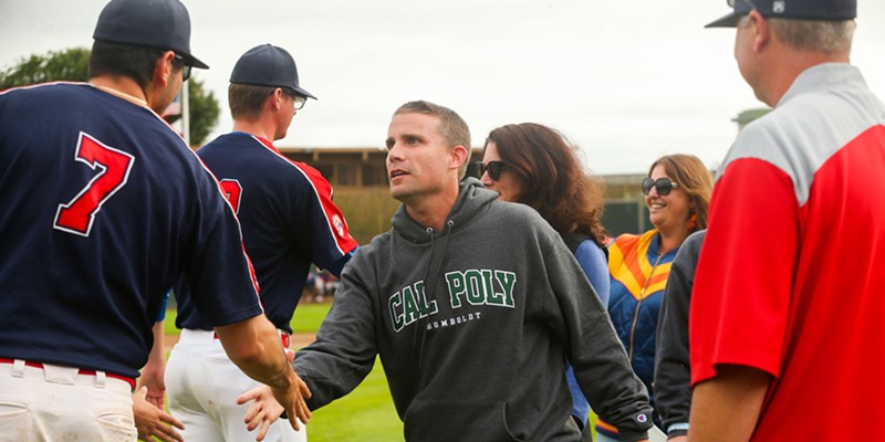 California state Senator Mike McGuire shakes hands with Crabs players and staff after announcing a $1 million investment from the State of California into Arcata Ballpark  prior to the start of the game on July 6, 2022.