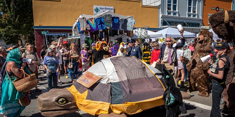 North Country Fair 2024 Street theater at the All Species Parade featured the antics of "Vote for Me!" James Hildebrand and the egg-laying turtle created by participants in the Our Space project of Playhouse Arts (the local arts agency for the City of Arcata). Photo by Mark Larson