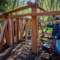 Year in Review by Mark Larson April: On one of our hikes, we found Master Builder Walt Lara Sr. inside the framework of the women's Dressing House under construction at Sum&eacute;g Village in then-named Patrick's Point State Park. "My favorite part of the project has been watching the boys do the work," said Lara. "They're a pretty good crew and it's important that traditional people are here doing it." Photo by Mark Larson
