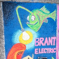 Pastels on the Plaza 2022 Artist Mataya Conroy brought light to her panel's creatures for sponsor Brandt Electric. Photo by Mark Larson