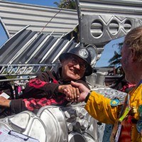 Kinetic Grand Championship 2024 Kinetic Grand Championship royalty Duane Flatmo greets fellow kinetic alumnus on the Arcata Plaza for the start of the race. Flatmo returns for the glory after not having raced in more than 10 years. Photo by Alexander Anderson