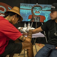 Nahaan (left), of Seattle, focuses on the design style of Northwest Pacific Coast practices, designs and customs of ceremonial tattooing.