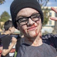 Jared Robinson and Anthony Quinn pose after the zombie flash mob invaded the Arcata Plaza on Oct. 25.