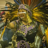 A member of the Tezkatlipoka Aztec Dance and Drum from San Jose performing at the Intertribal Gathering on Saturday.