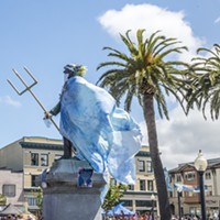 McKinley, whose fate was sealed in 2018, stands sentry over the plaza, clad in Poseidon's robes, for Oyster Fest.