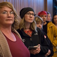 Jill Larrabee, left, waits to speak at the Arcata City Council meeting regarding the Josiah Lawson case and joined others in calling on city officials to call the DOJ or another outside agency to assist the investigation.