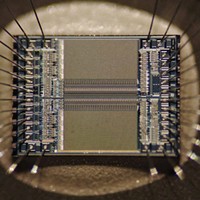 EPROM microchip die showing detail of an integrated circuit. Researchers doubt that IC chips can be manufactured beyond the 3-nanometer scale.