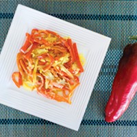Sunny, sweet red peppers and onions with a kick of curry spice.