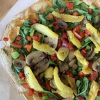 The veggie flatbread, essentially a salad that knows how to have a good time.
