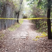 Police tape blocks off an area in Blue Lake where a dead body was found Sunday.