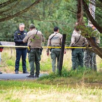 Personnel from multiple agencies responded to Mad River Road after an officer involved shooting to gather evidence and process the scene.