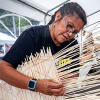 Phyllis Hunter, of the Mono Tribe and Tollhouse, California, demonstrated her weaving technique in making a cradle board.