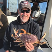 Randy Barthman of Westhaven holds up a Dungeness crab from a few seasons back while crabbing aboard the Reel Steel out of Eureka. The 2022 sport Dungeness crab opener is slated to open Saturday, Nov. 5.