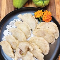 Thick, barely sweet rice flour dumplings stuffed with pork and crunchy chayote.