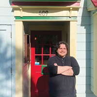 Madison Lopez at Opera Alley Bistro, where he's both chef and musical entertainment.