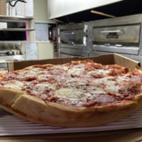 A deep-dish Chicago pizza straight from the oven at Brett's Pizzeria.
