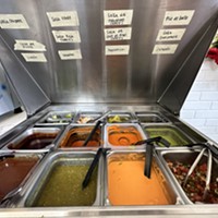 A rainbow of salsa options at Paco's Tacos Taqueria.