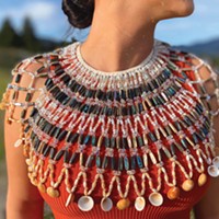 Shoshoni Hostler's intricate cape with abalone shell.