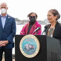 Flanked by Congressman Jared Huffman and Council on Environmental Quality Chair Brenda Mallory, U.S. Secretary of the Interior Deb Haaland speaks at a press conference about offshore wind power at the Woodley Island Marina.