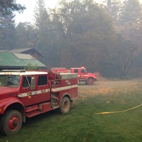 Cal Fire engines responded to defend the home of Collins and Lance.