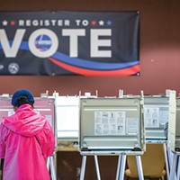 Voters cast their ballots at a polling station at the Sacramento County Elections Office on Nov. 8, 2022.