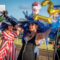 Tracey Van Emmerik (center) of Ferndale celebrated her Most Glamorous award and her runner-up winner prize of $1,000 after the sixth race.