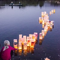 Lanterns float out onto Klopp Lake during the 33rd annual ceremony.